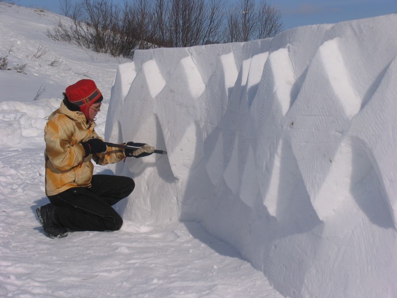 Relate North 2014: Art, Heritage and Identity Saami girl carving snow-art.